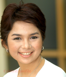 Biography Joy Tobing